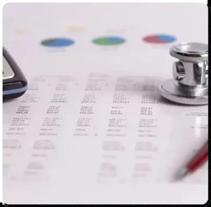 Cardiology Billing - A medical billing sheet with stethoscope around it