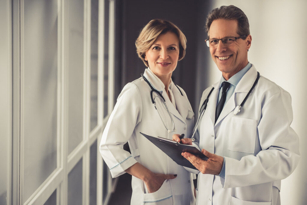 Neurology billing services- two doctors smiling