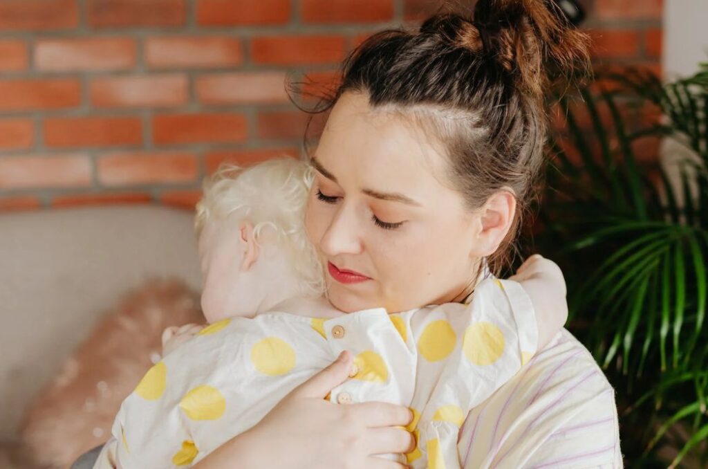 A women holding a child