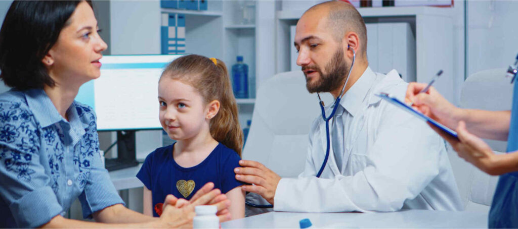 Pediatric Billing Services USA-Doctor examining a child