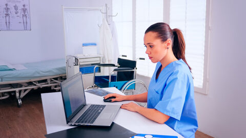 A paramedic using laptop
