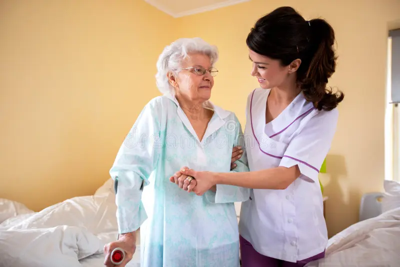 A nurse Helping Elderly
