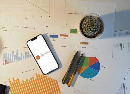 Phone on chart papers